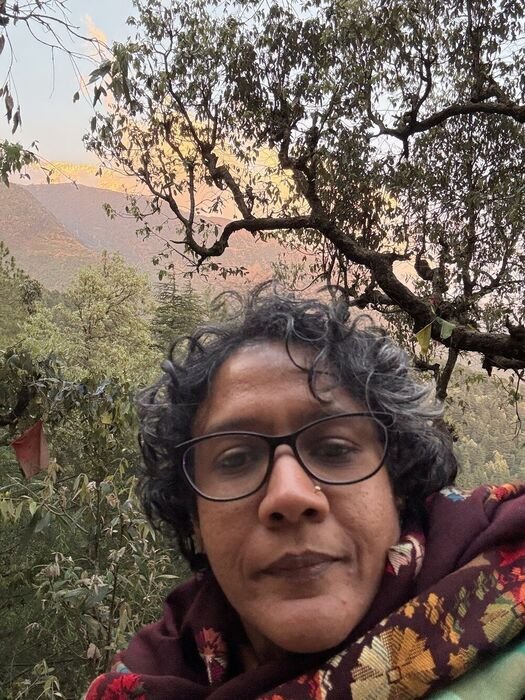 Nitya in the mountains at dusk