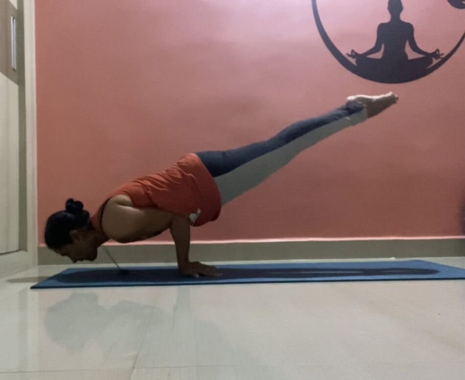 Nitya in Mayurasana, the peacock pose