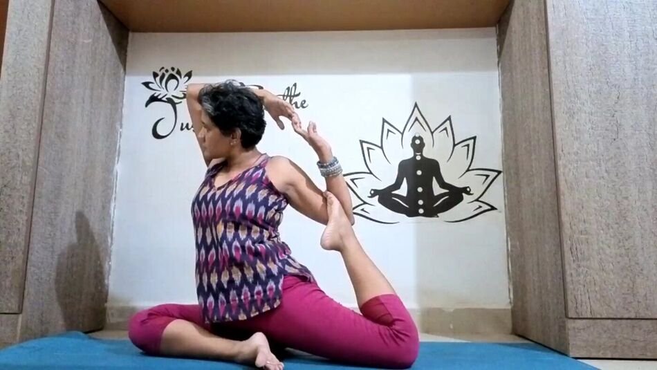 Nitya in Eka Pada Rajakapotasana, the one-legged king pigeon pose